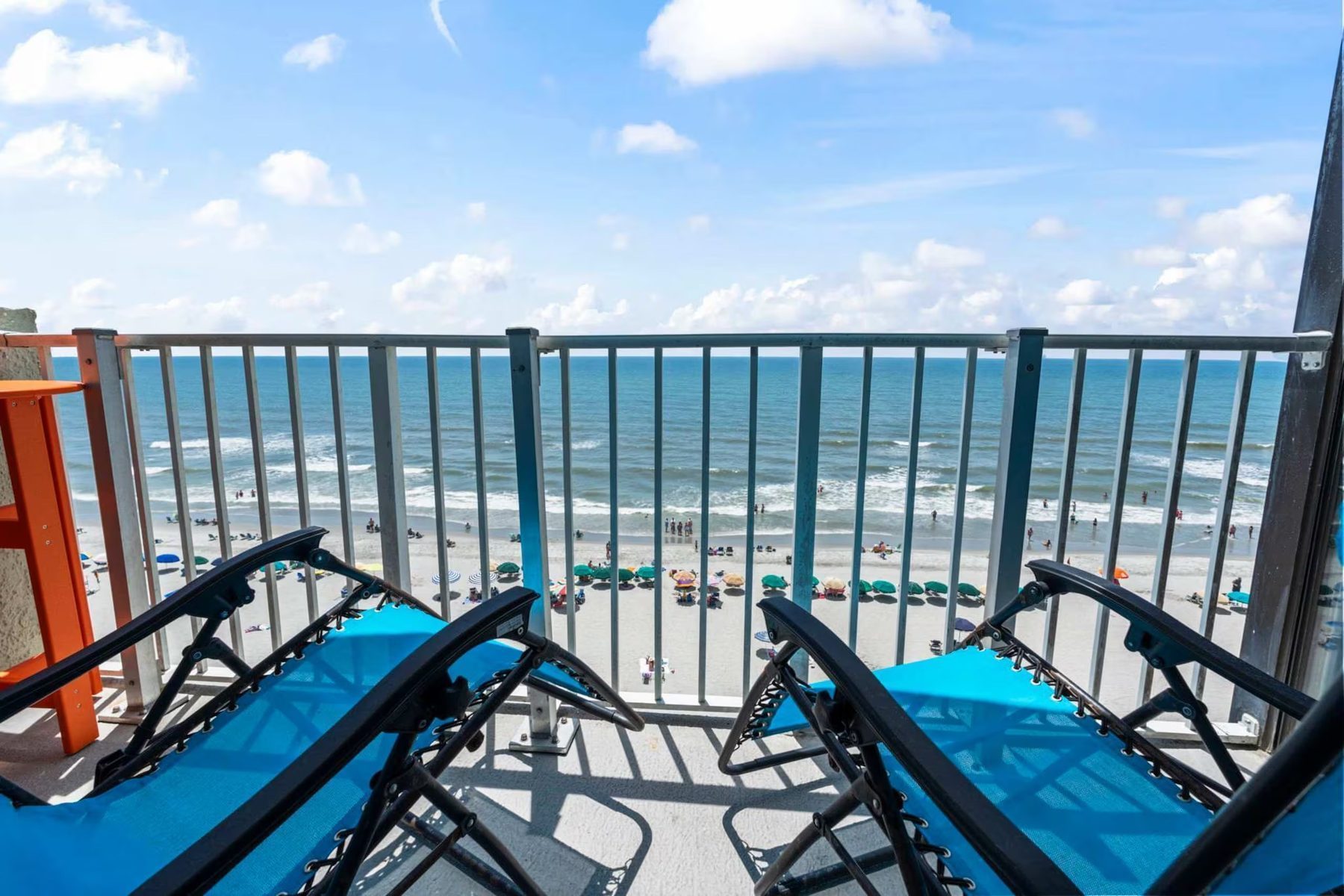 Private oceanfront balcony with seating at 728 Sands Beach Club, Shore Drive