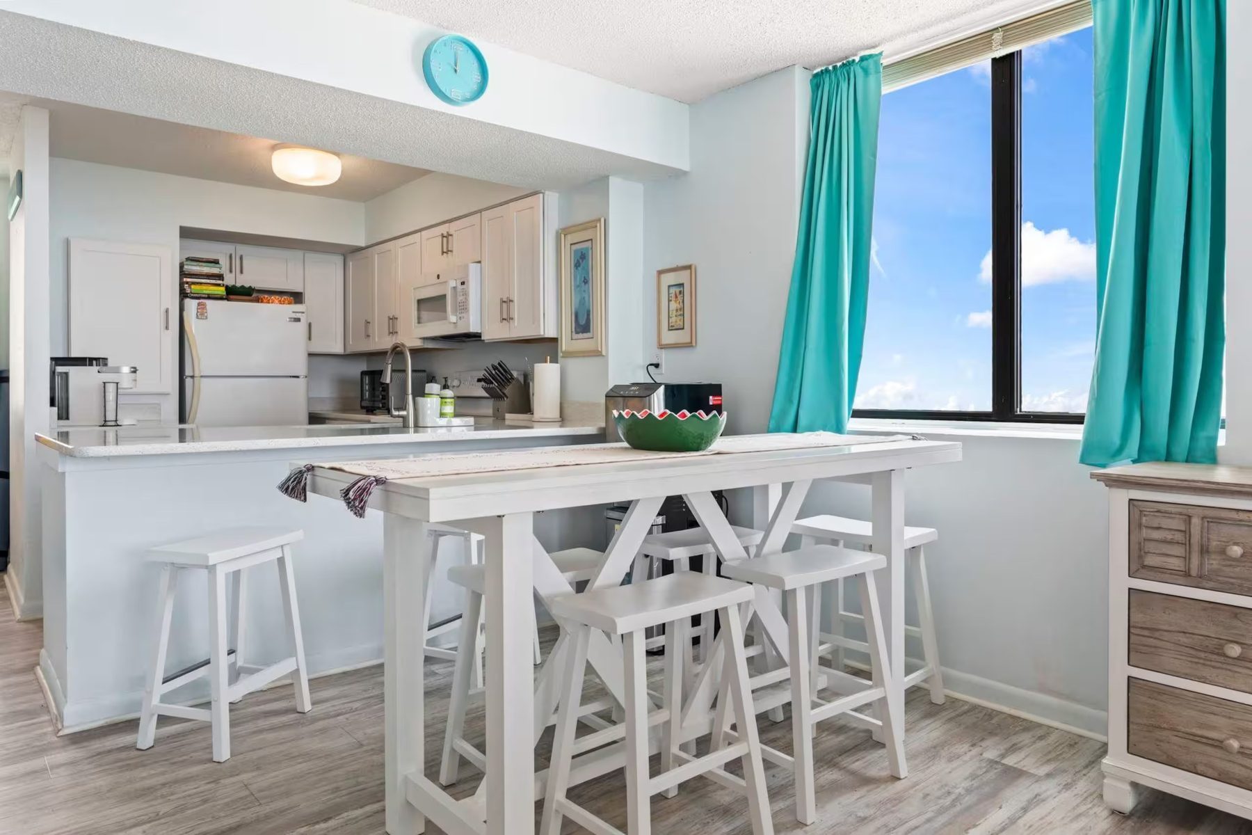 Dining area in the open living space at Unit 728 Sands Beach Club