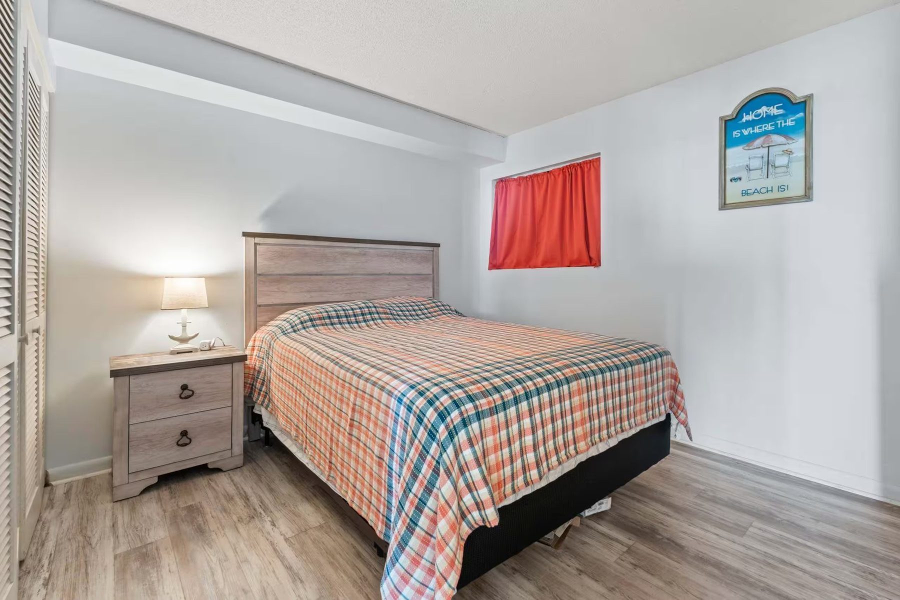Second bedroom with queen bed in the 2-bedroom Unit 728 condo, Myrtle Beach
